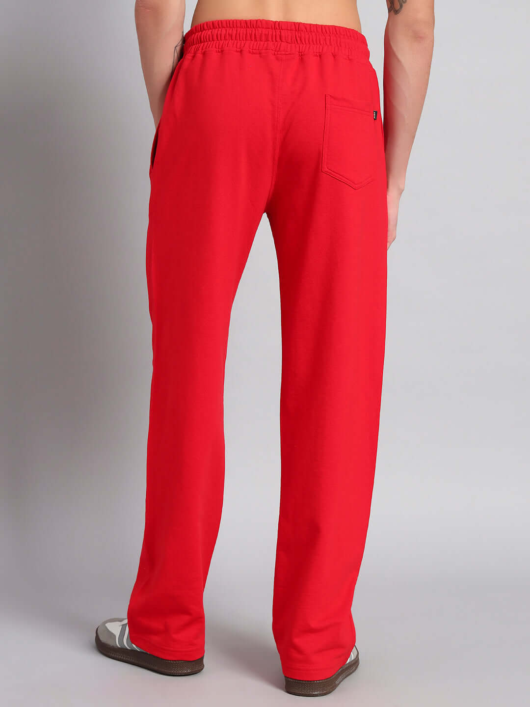 Back view of REDX BRANCHING COTTON JOGGER RED MEN showcasing comfortable fit and pocket detail.