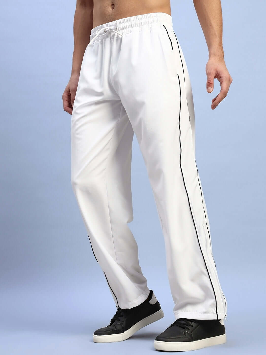 White relaxed-fit joggers featuring a customizable size option, perfect for comfort and style; available for custom fit on prepaid orders.