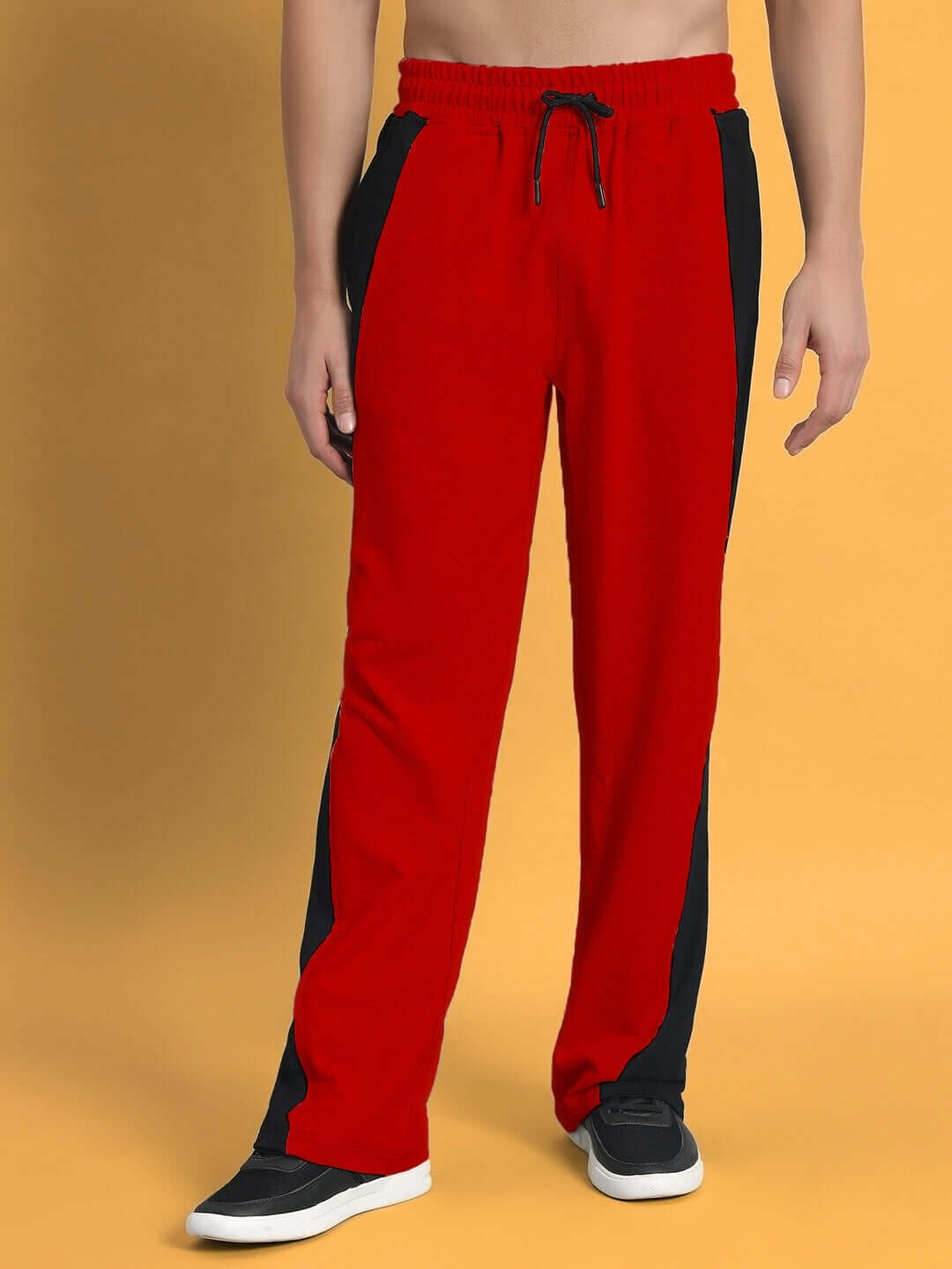 REVIVE Side Contrast Joggers in Red-Black, shown on model, featuring drawstring waist and made to order by DUDS.
