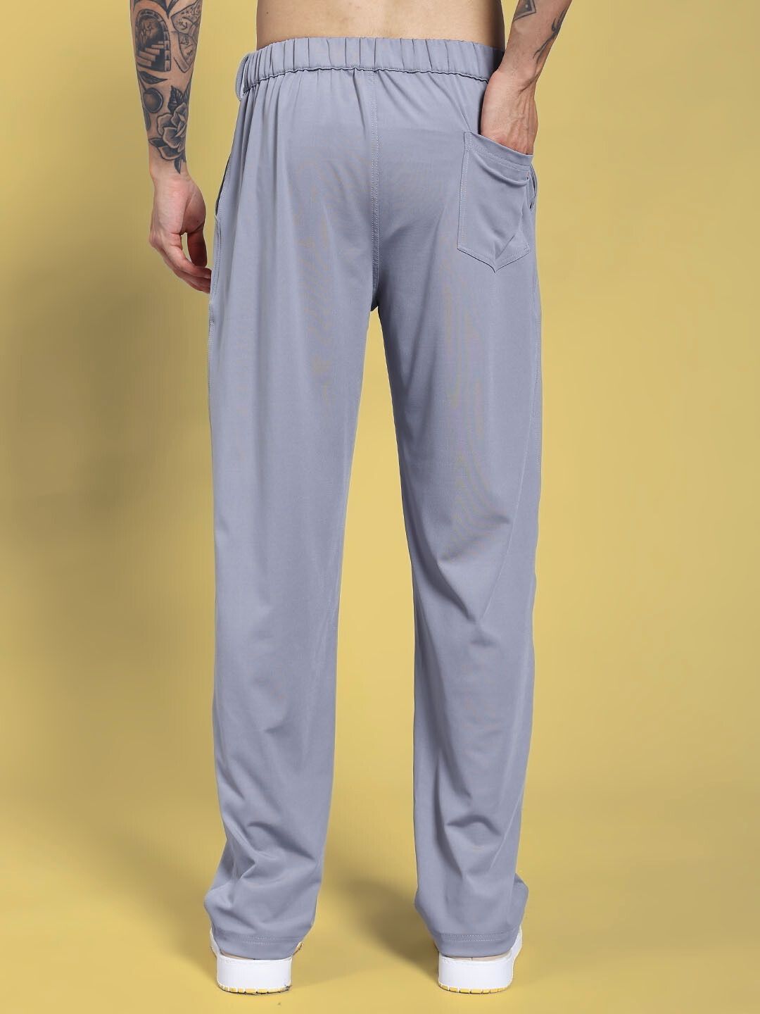 Back view of REVOXX RELAXED FIT JOGGER GREY in premium flex-blend fabric showcasing relaxed fit and pocket detail.