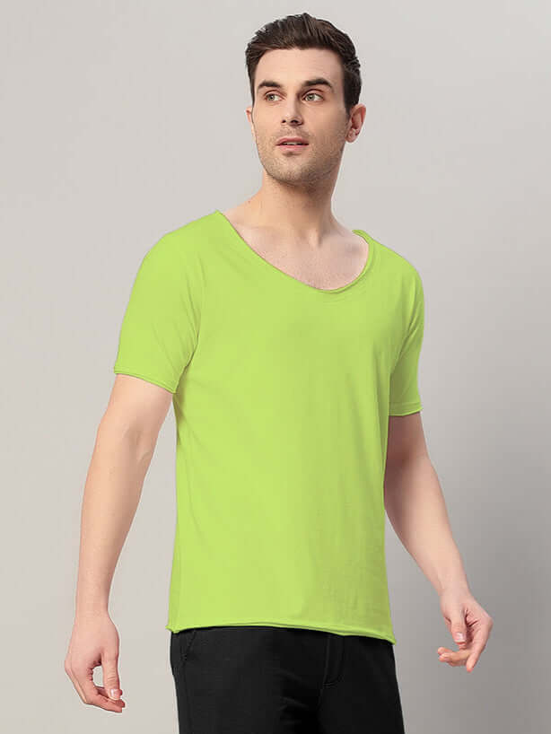 Model wearing Ricky Regular Fit Neon Green T-Shirt, 100% cotton, premium heavy gauge fabric, 190 GSM, bio-washed for softness.