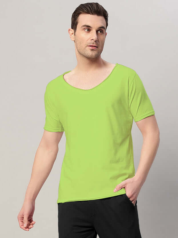 Model wearing Ricky Regular Fit T-Shirt in Neon Green, crafted from 100% cotton, showcases a stylish and comfortable design.