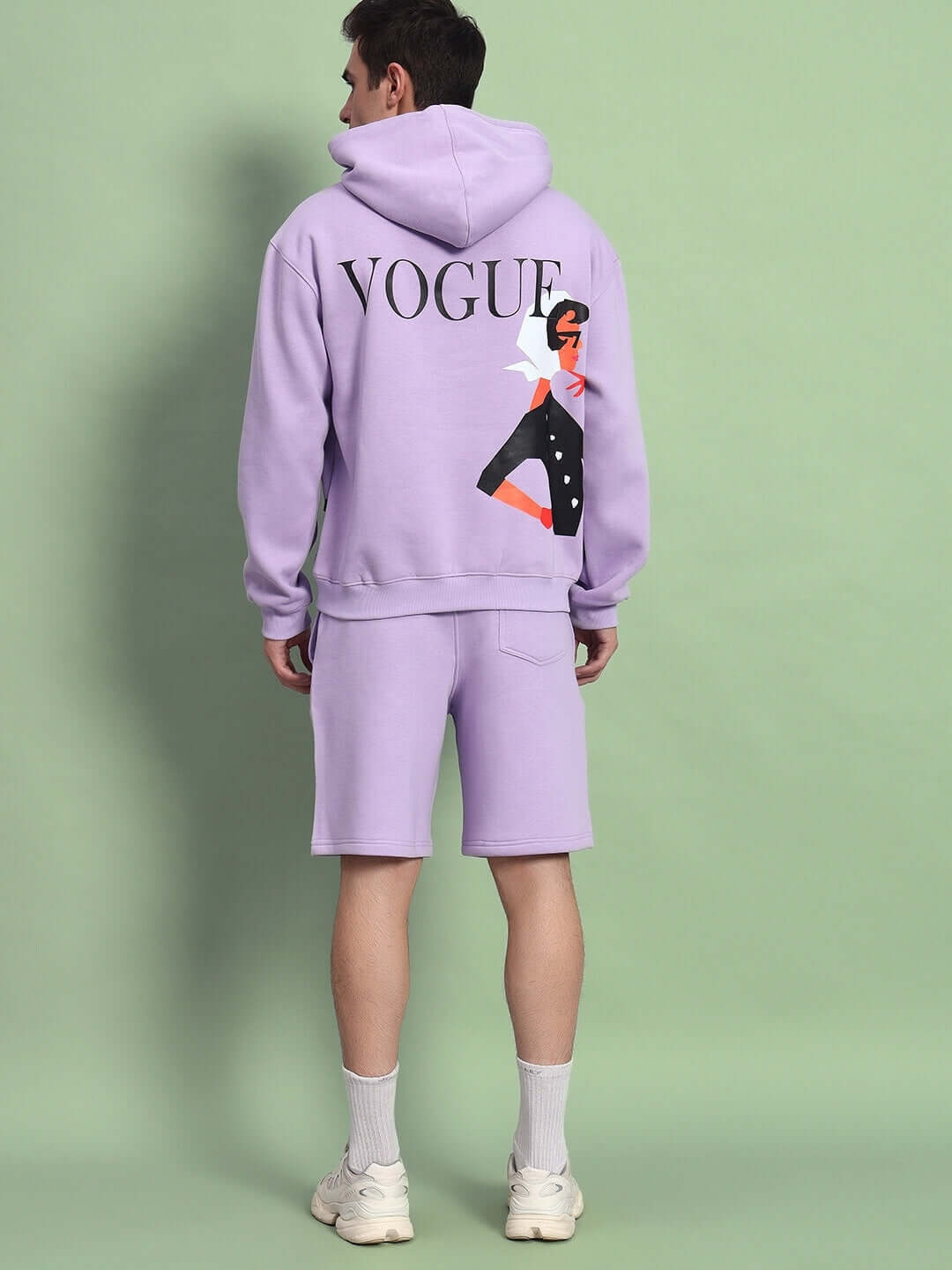 Man wearing WEARDUDS RITZY FLEECE CO-ORD LILAC hoodie and shorts, showcasing the stylish back design.
