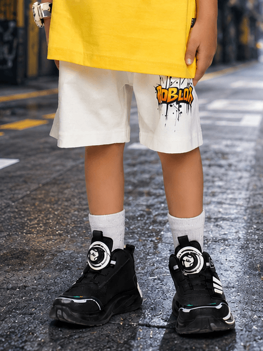 ROBLOX RUSH COOL SHORTS FOR BOYS GIRLS LIGHT WHITE worn with sneakers, showcasing a bold Roblox graphic design.