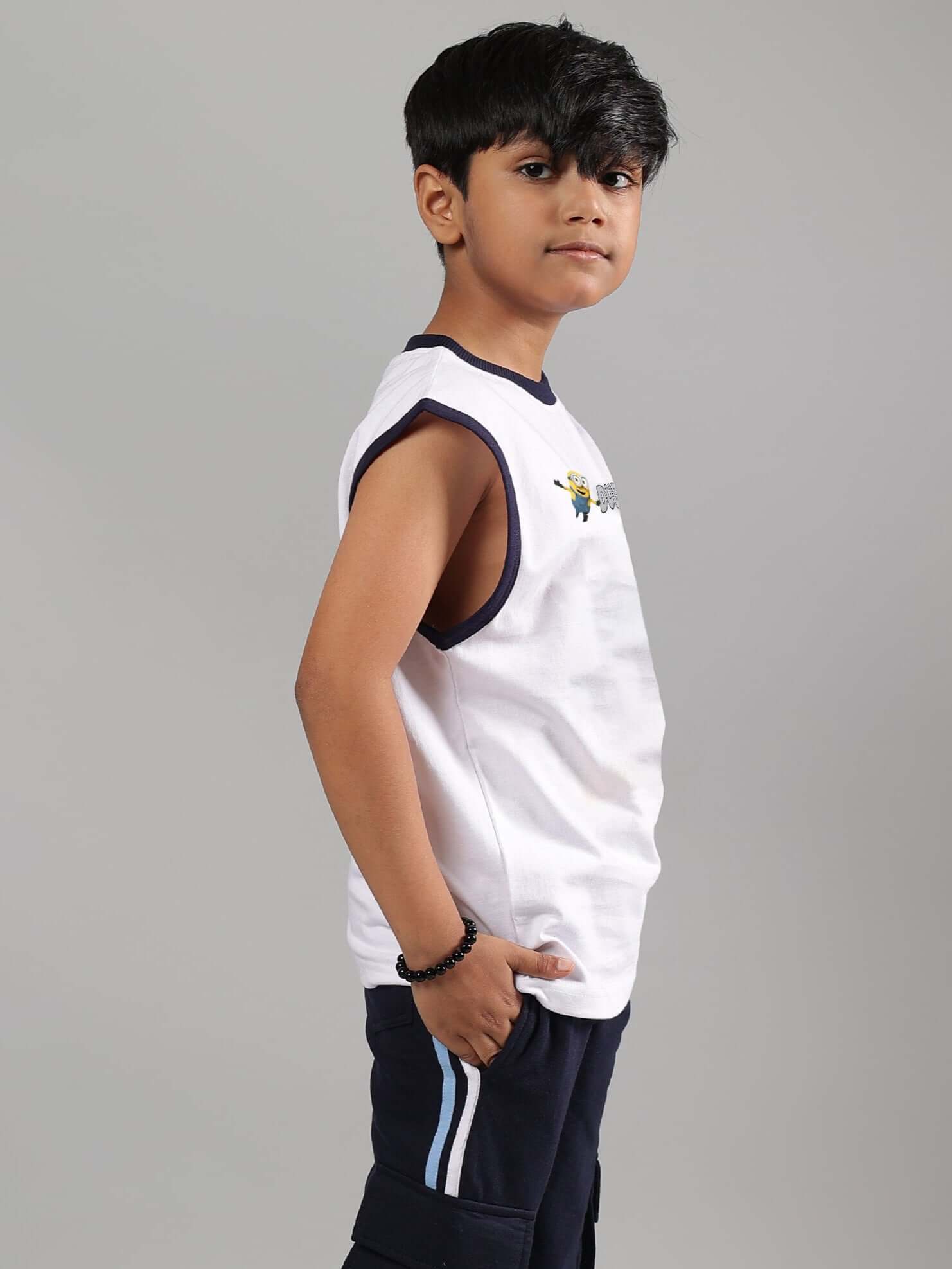 Boy wearing ROBO MINIONS white t-shirt, side view