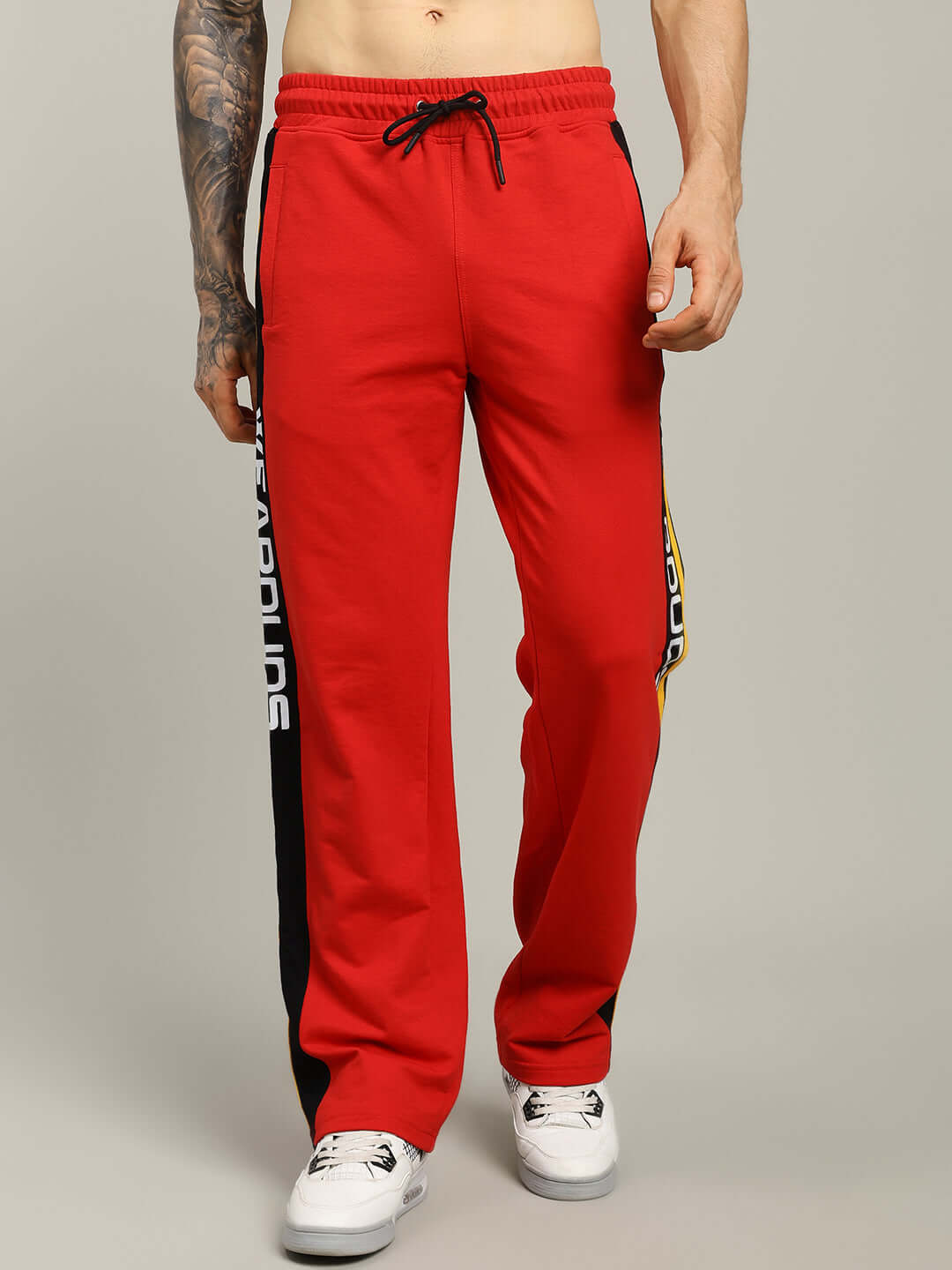 ROGER RELAXED-FIT JOGGERS RED MEN displayed on model with casual shoes