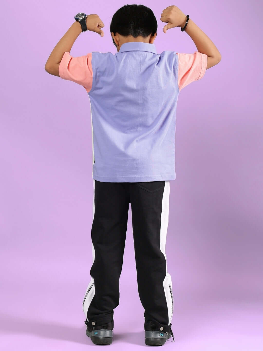 Child wearing ROMAN CO-ORD FOR BOYS & GIRLS MULTI-BLACK set, back view, showcasing trendy design and comfortable fit for active kids.