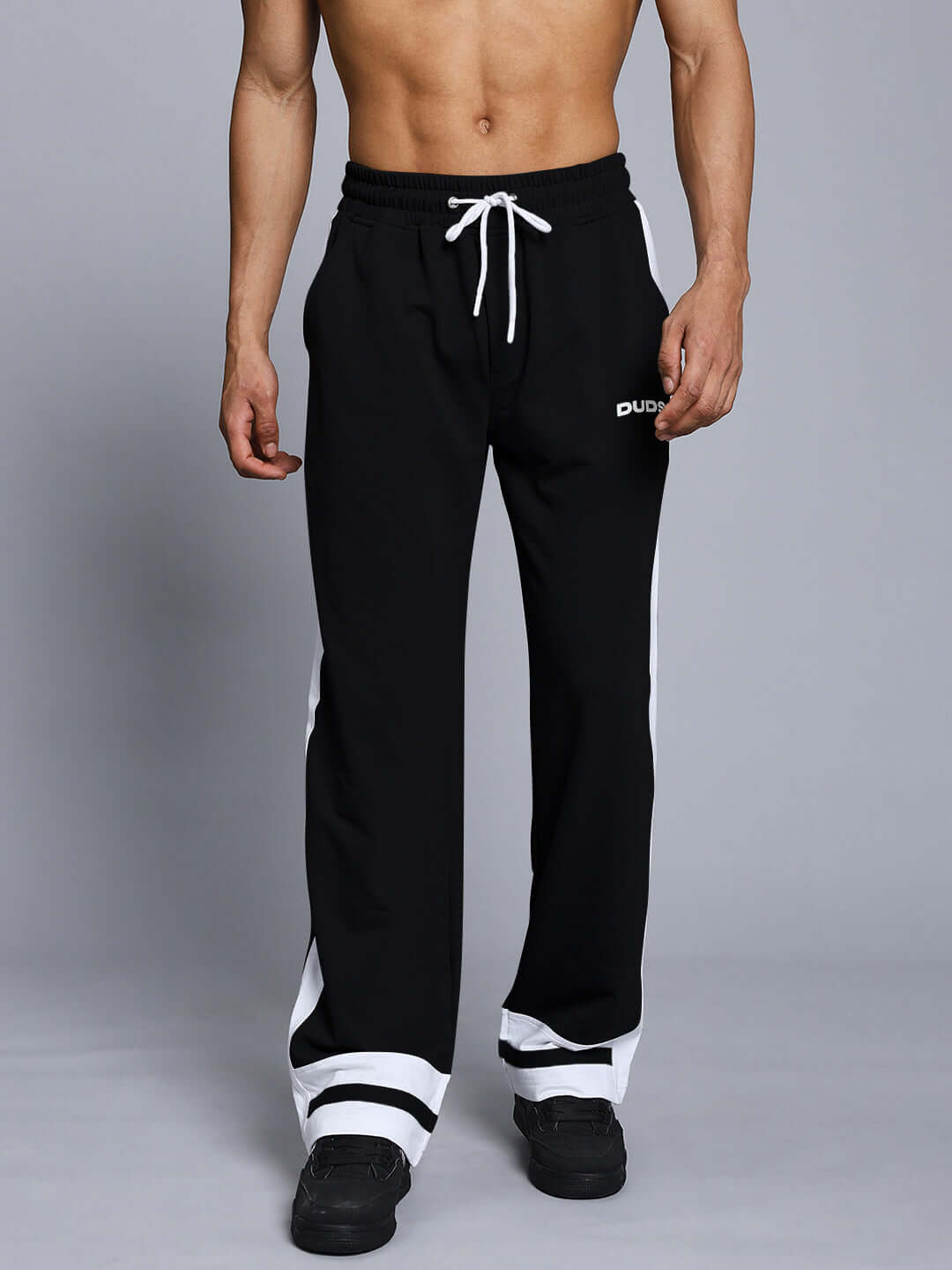 Men's Ronny Side Stripe Jogger in Black-White by DUDS, featuring a comfortable elastic waistband and customizable fit.