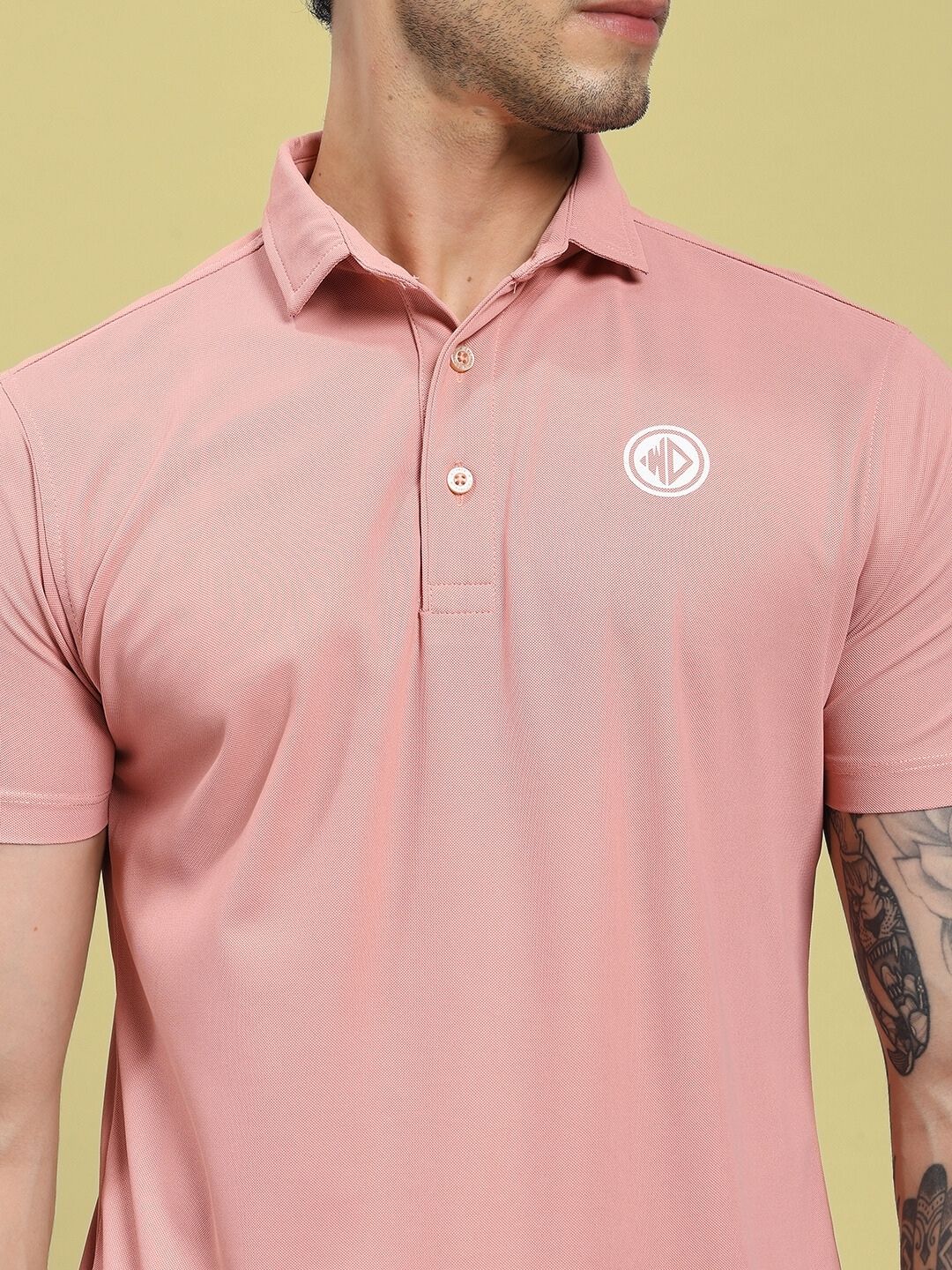 Close-up of the ROSEWOOD POLO REGULAR FIT T-SHIRT PINK, showing its elegant design and breathability, ideal for comfort and style.
