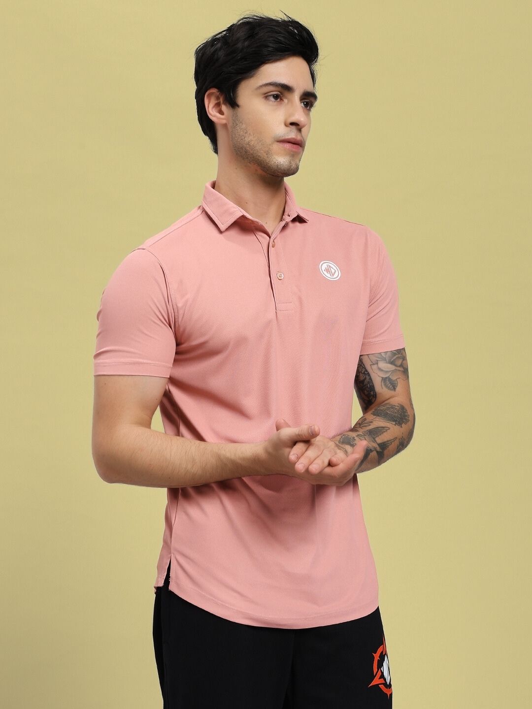Man wearing ROSEWOOD POLO REGULAR FIT T-SHIRT PINK for elegance and comfort.