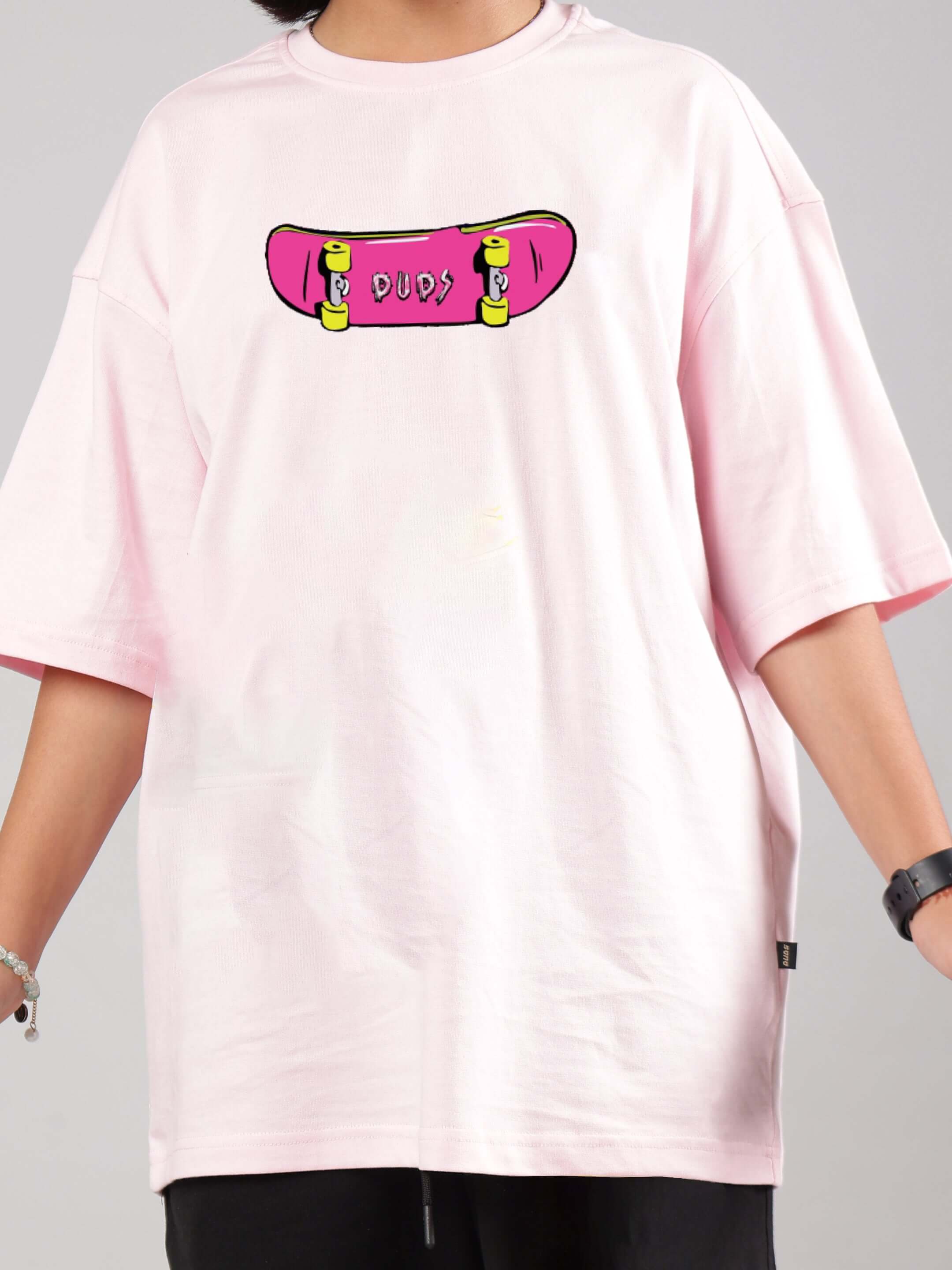Pink oversized t-shirt for boys and girls with skateboard graphic from DUDS, customizable fit, 7-10 days dispatch.