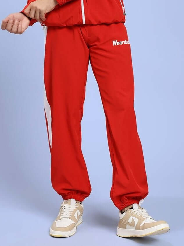 ROYAL COMFORT RELAXED FIT JOGGER RED for stylish loungewear in vibrant red, shown on model from waist to sneakers.