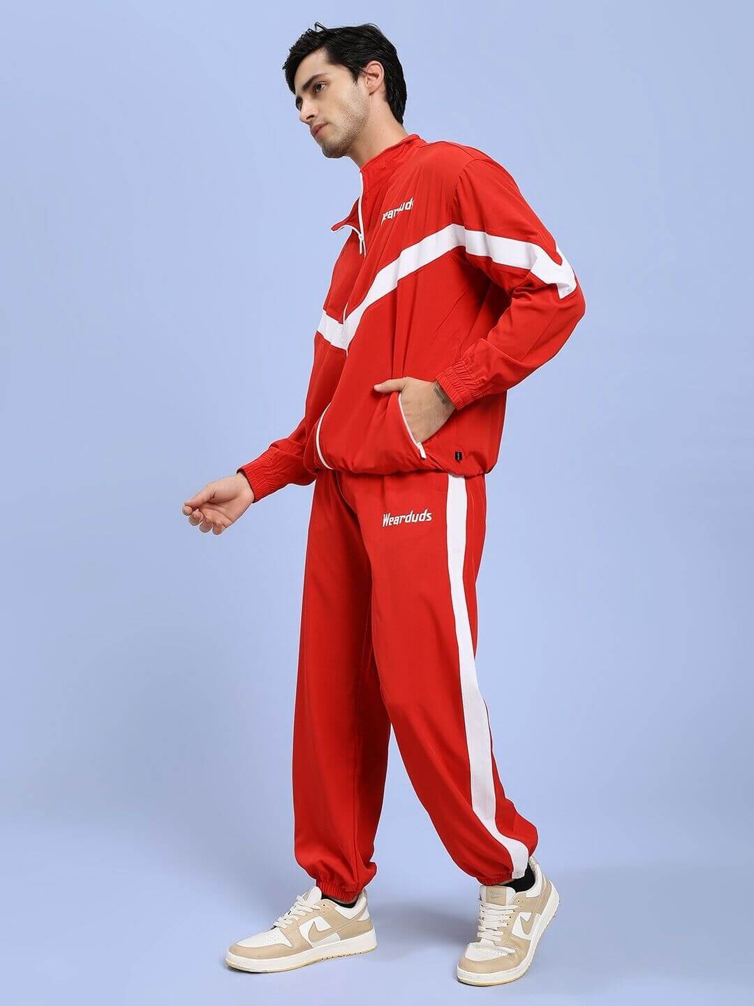 Man wearing ROYAL COMFORT RELAXED FIT CO-ORD SET RED, showcasing luxury and comfort in vibrant red ensemble.