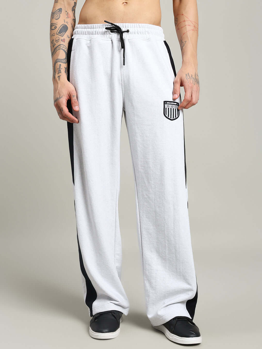 ROYALSON COTTON JOGGERS MELANGE-GREY displayed on a model, featuring cotton terry fabric and contrast panels for modern casual style.