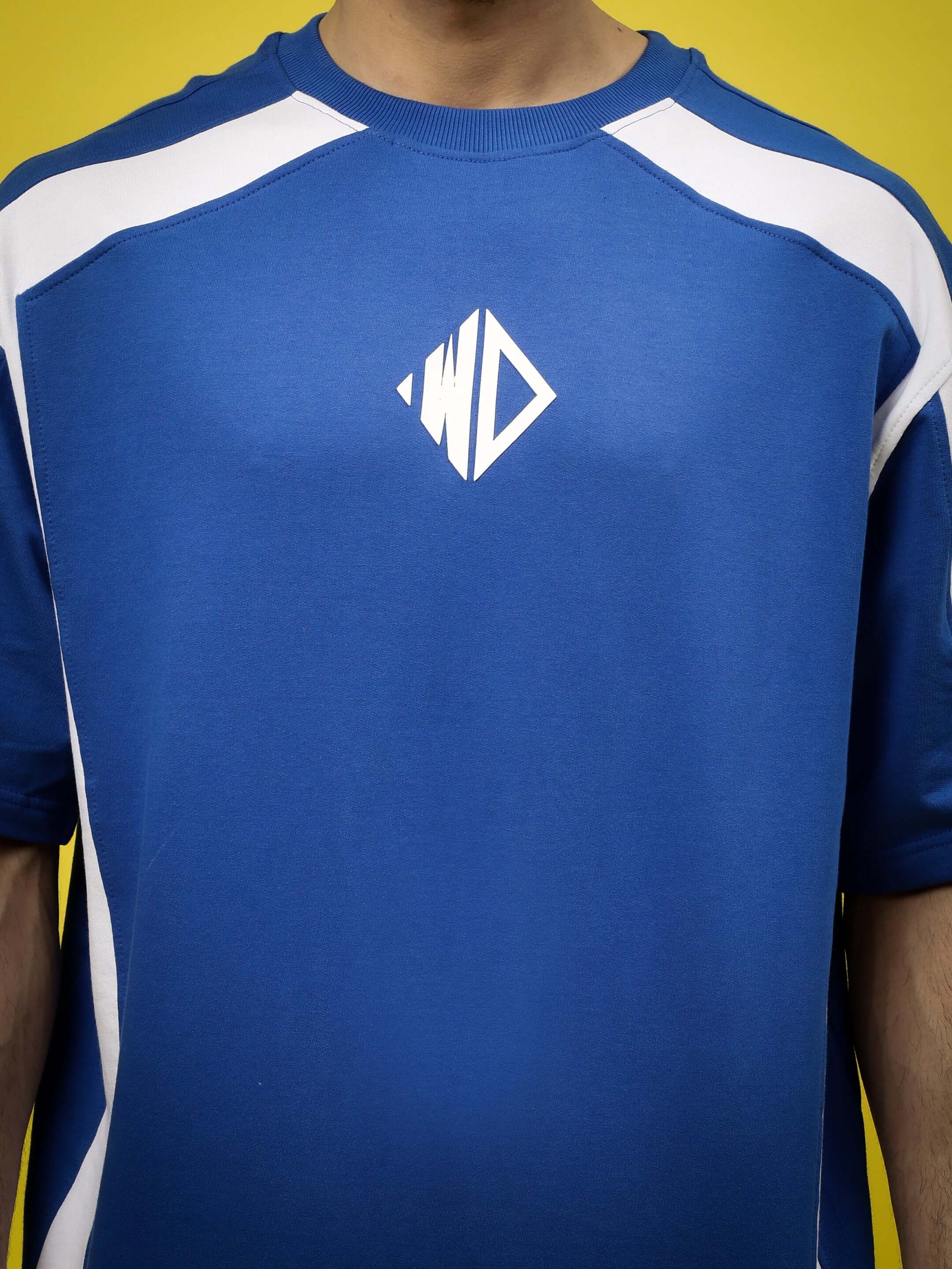 Rugby over-sized T-shirt in royal blue and white with logo, premium cotton fabric, heavy gauge, medium fit, vibrant sportswear style.