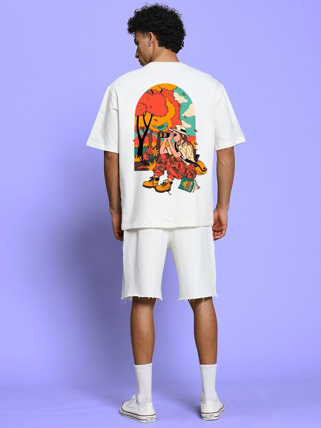 Back view of SAFARI PRINTED CO-ORD SET OFF-WHITE with bold safari-inspired artwork on oversized tee.