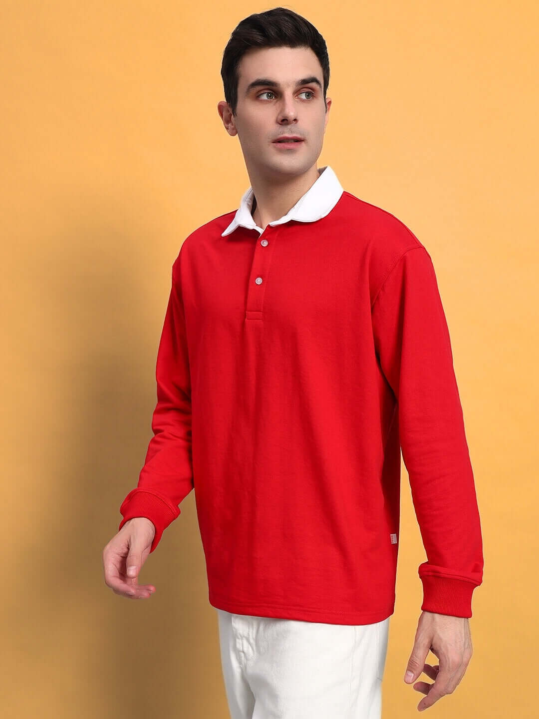 Model wearing SAGOL POLO oversized red sweatshirt made from premium cotton French terry and Lycra, showcasing a stylish casual look.