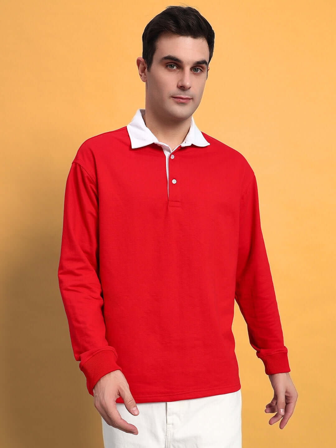 Model wearing Sagol Polo Oversized Sweatshirt in red, featuring premium cotton French Terry, styled with white collar detail.