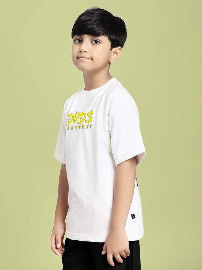 Boy wearing SAMURAI SOUL PRINTED T-SHIRT FOR BOYS AND GIRLS WHITE, showcasing a samurai-inspired graphic design on a crisp white tee.