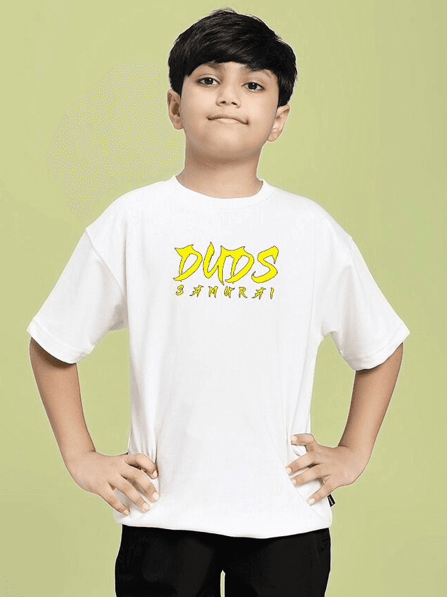 Boy wearing SAMURAI SOUL PRINTED T-SHIRT FOR BOYS AND GIRLS WHITE, showcasing bold graphic design on a crisp white tee.