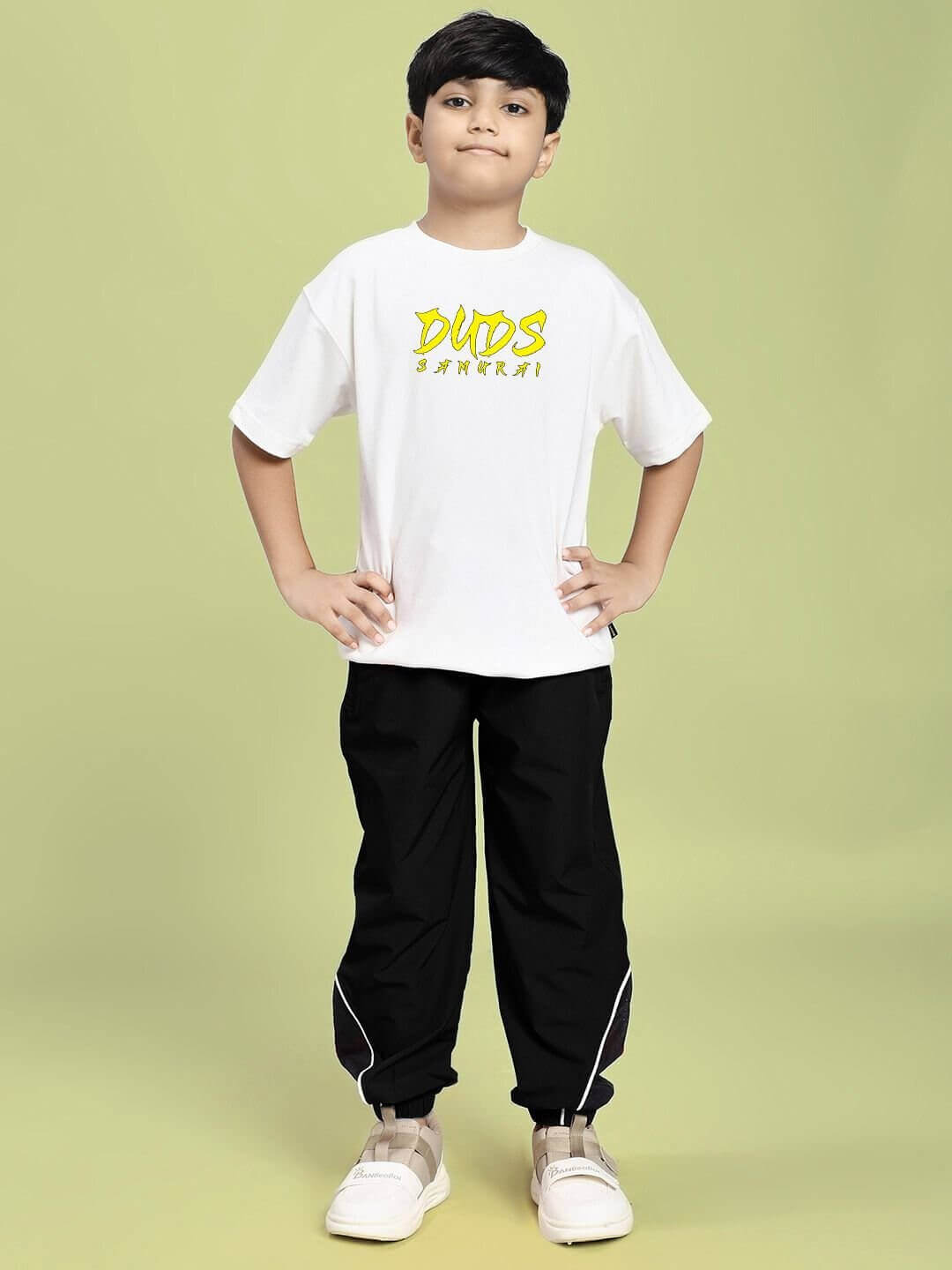 Boy wearing SAMURAI SOUL PRINTED T-SHIRT FOR BOYS AND GIRLS WHITE with samurai-inspired design, exuding modern street style.