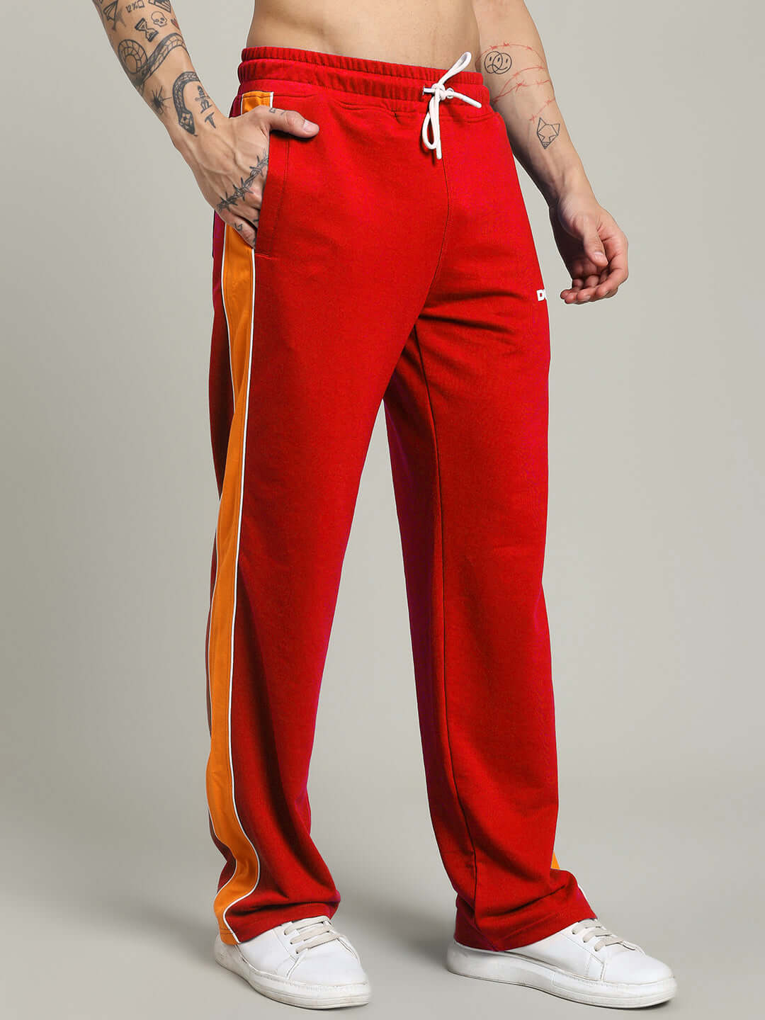 Red Sanford Stripe Joggers by DUDS, featuring customizable fit for prepaid orders, crafted by experienced tailors. Shipping in 7-10 days.