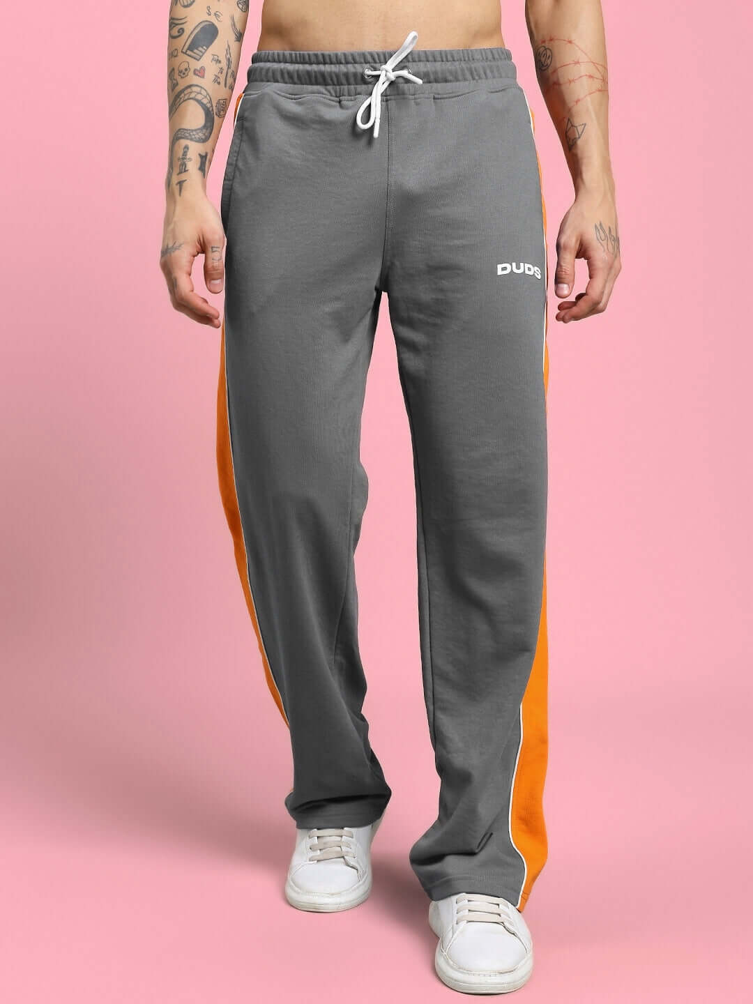 Sanford Stripe Joggers in grey with orange side stripes, custom fit option available; stylish and comfortable fashion by DUDS.