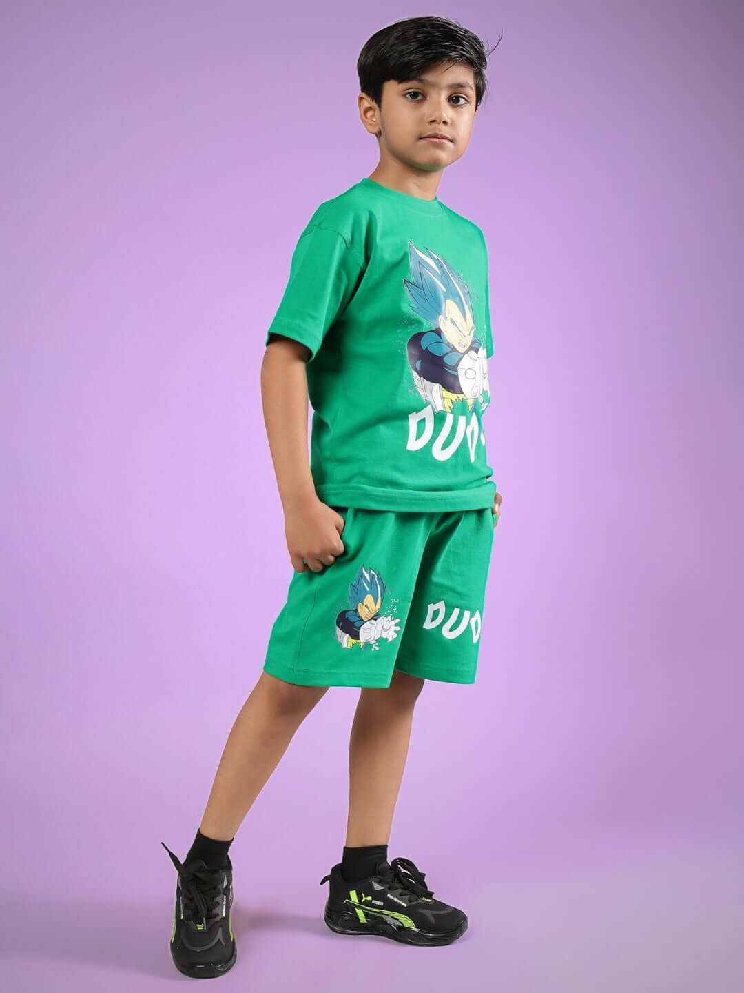 Child wearing green Satoru Co-Ord set from DUDS, featuring a stylish design for boys and girls, highlighting comfort and custom fit options.