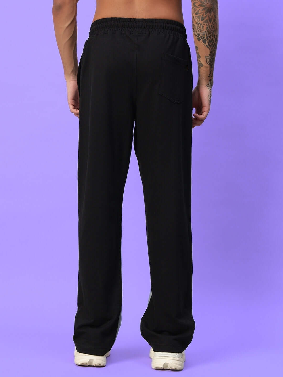 Back view of SCALE relaxed fit joggers (multi), showcasing comfortable design and elastic waistband, perfect for casual wear.