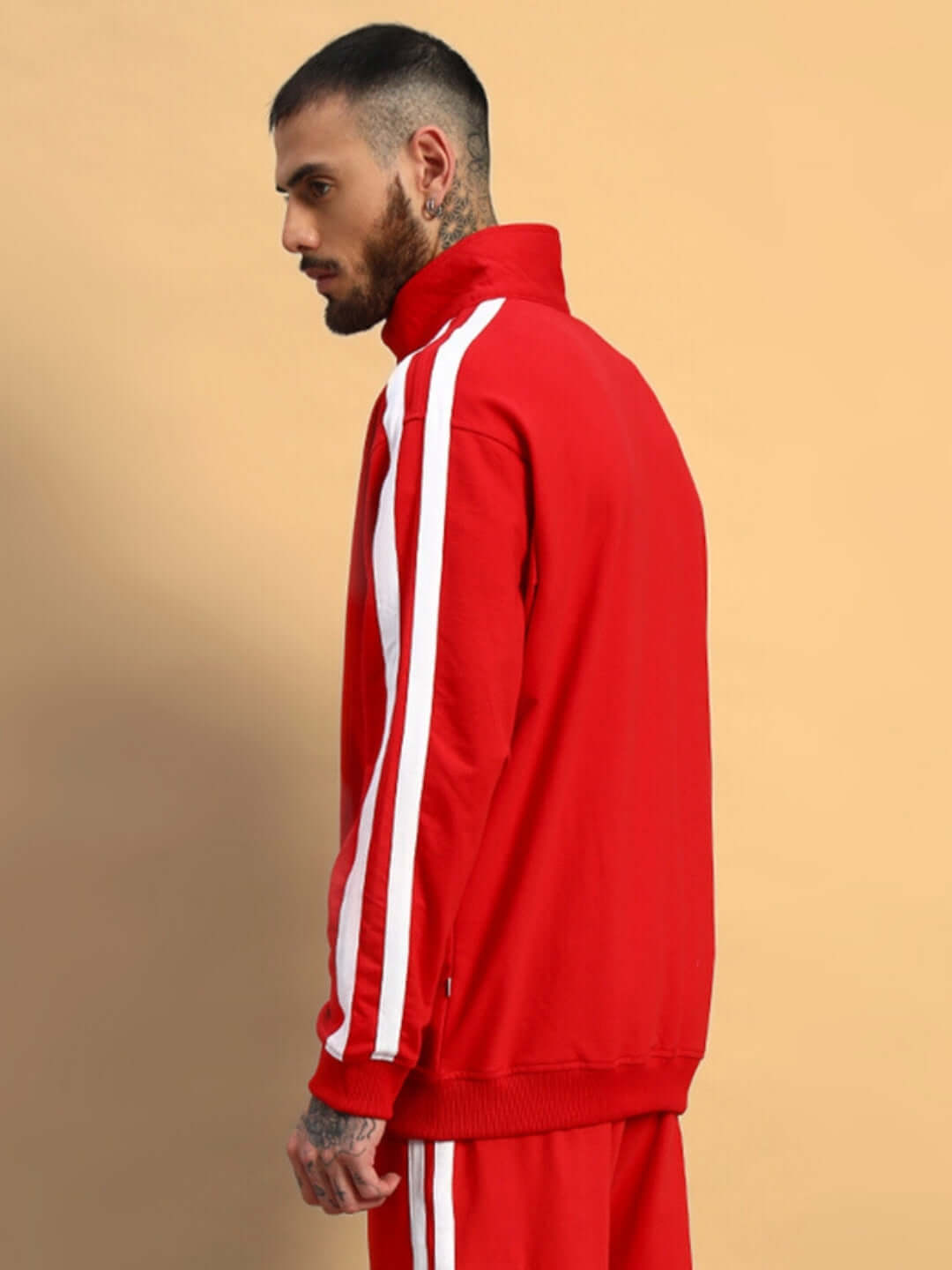 Red SCOTIA Jacket with white stripes, worn by a model, showcasing custom fit option by DUDS, tailor-made and available for preorder.