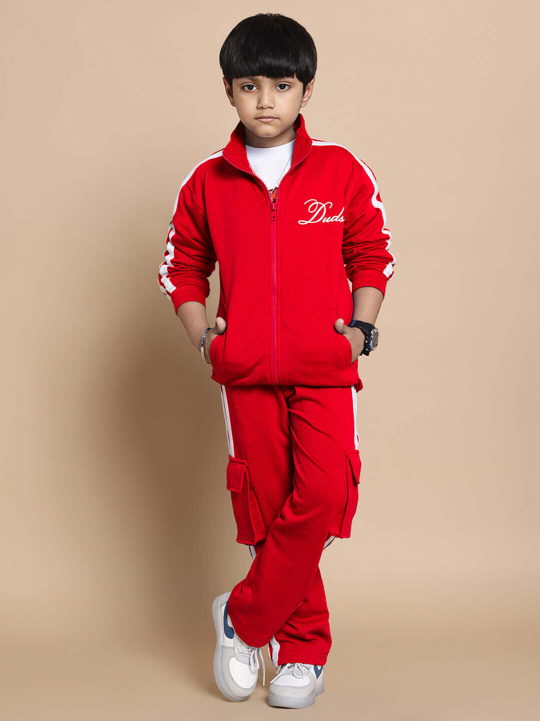 Child wearing red Scotia Co-ord set, 100% cotton terry fabric; suitable for boys and girls; perfect for casual outings or sports. Manufactured in India.