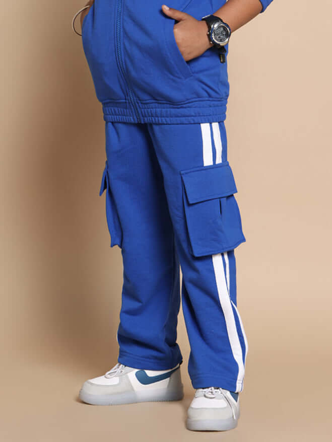 Royal blue Scotia Stripe joggers for boys & girls with side pockets and white stripes, customizable fit by DUDS.