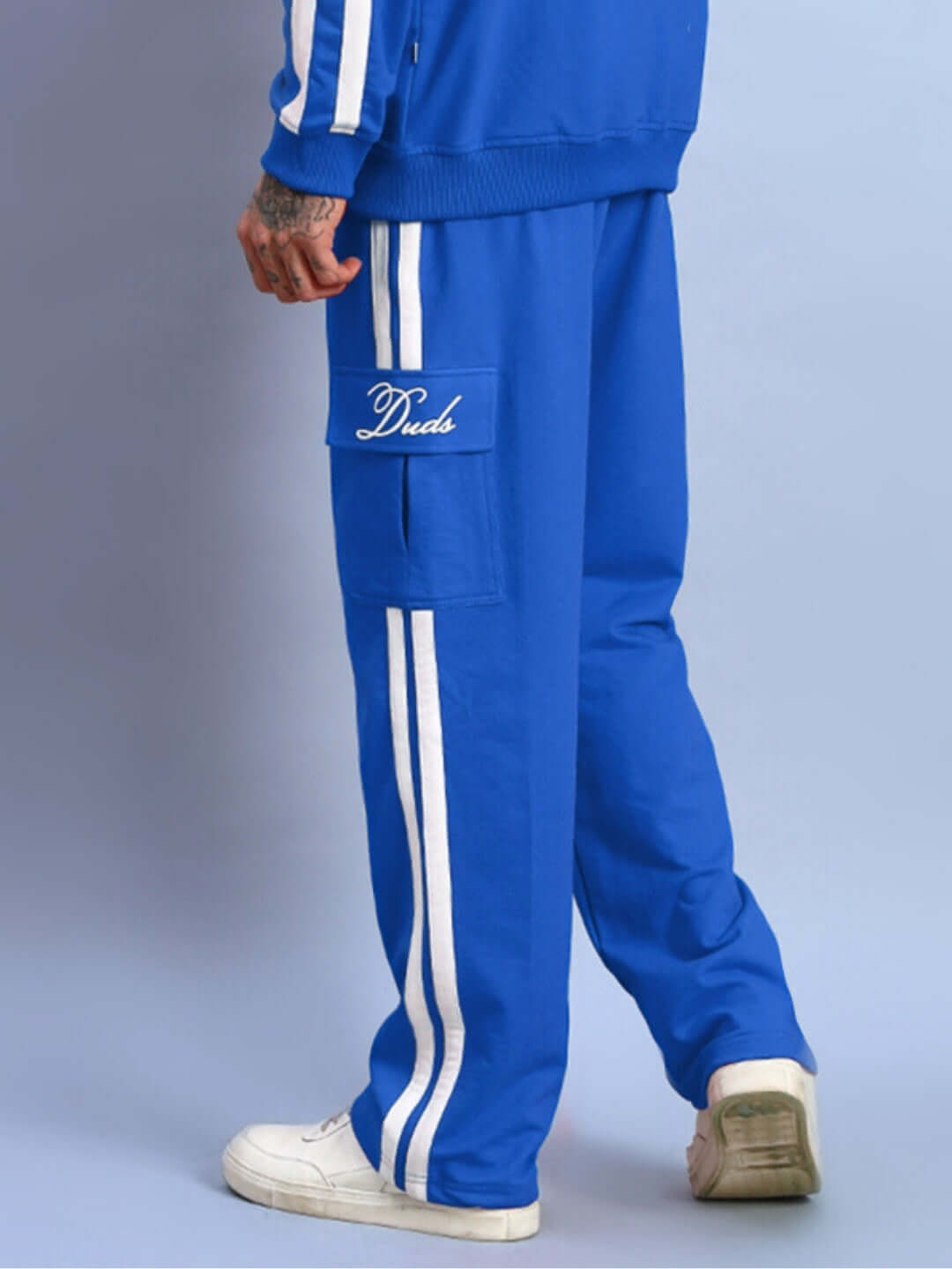 Royal blue SCOTIA STRIPE JOGGERS by DUDS featuring white stripes, made-to-order with custom fit option.