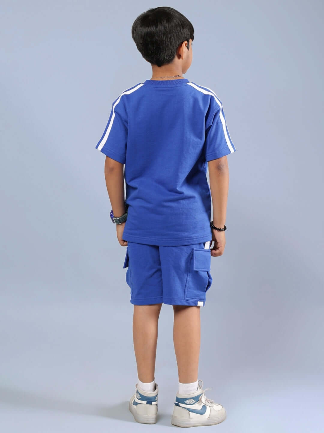 Back view of a child wearing Scotia Summer Co-ord for Boys & Girls in Royal Blue, showcasing a stylish, comfortable look.