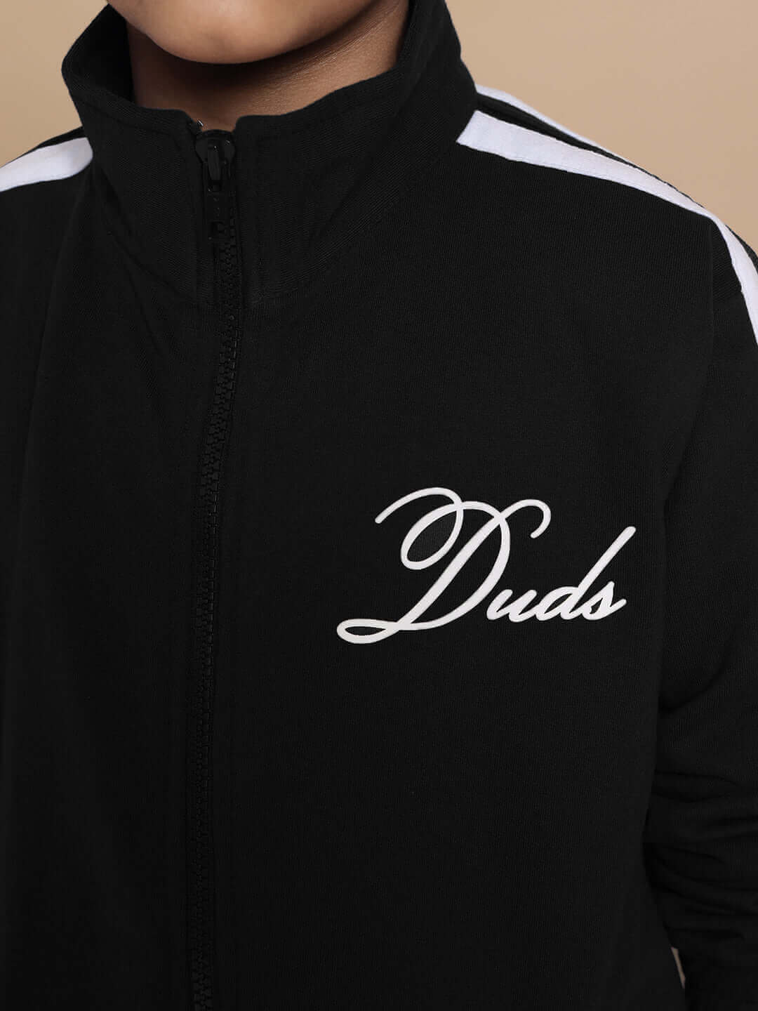 Close-up of Scotia Co-ord Set in black with "Duds" logo, premium cotton fabric for boys and girls.