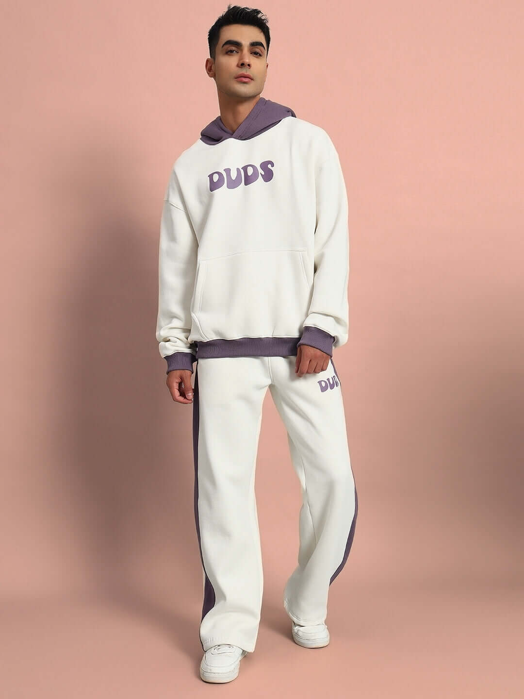 Model wearing SELF LOVE FLEECE CO-ORD WHITE VIOLET, featuring oversized hoodie and joggers with 'Self Love' graphic, front view.