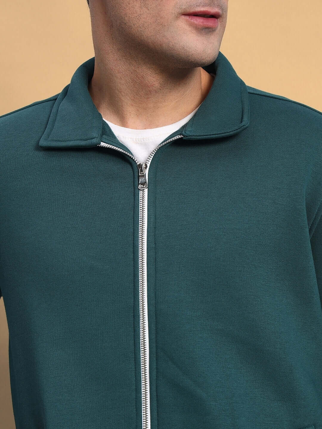 Teal green shaggy zipper fleece co-ord set from DUDS, featuring a customizable fit by expert tailors, shown on a man.