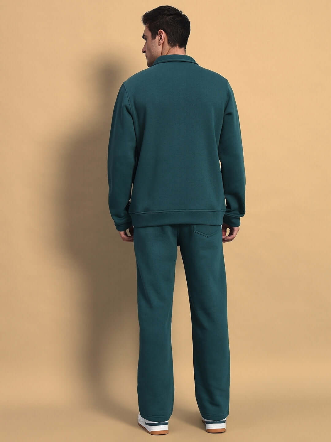 Back view of SHAGGY ZIPPER FLEECE CO-ORD SET TEAL GREEN worn by a model.