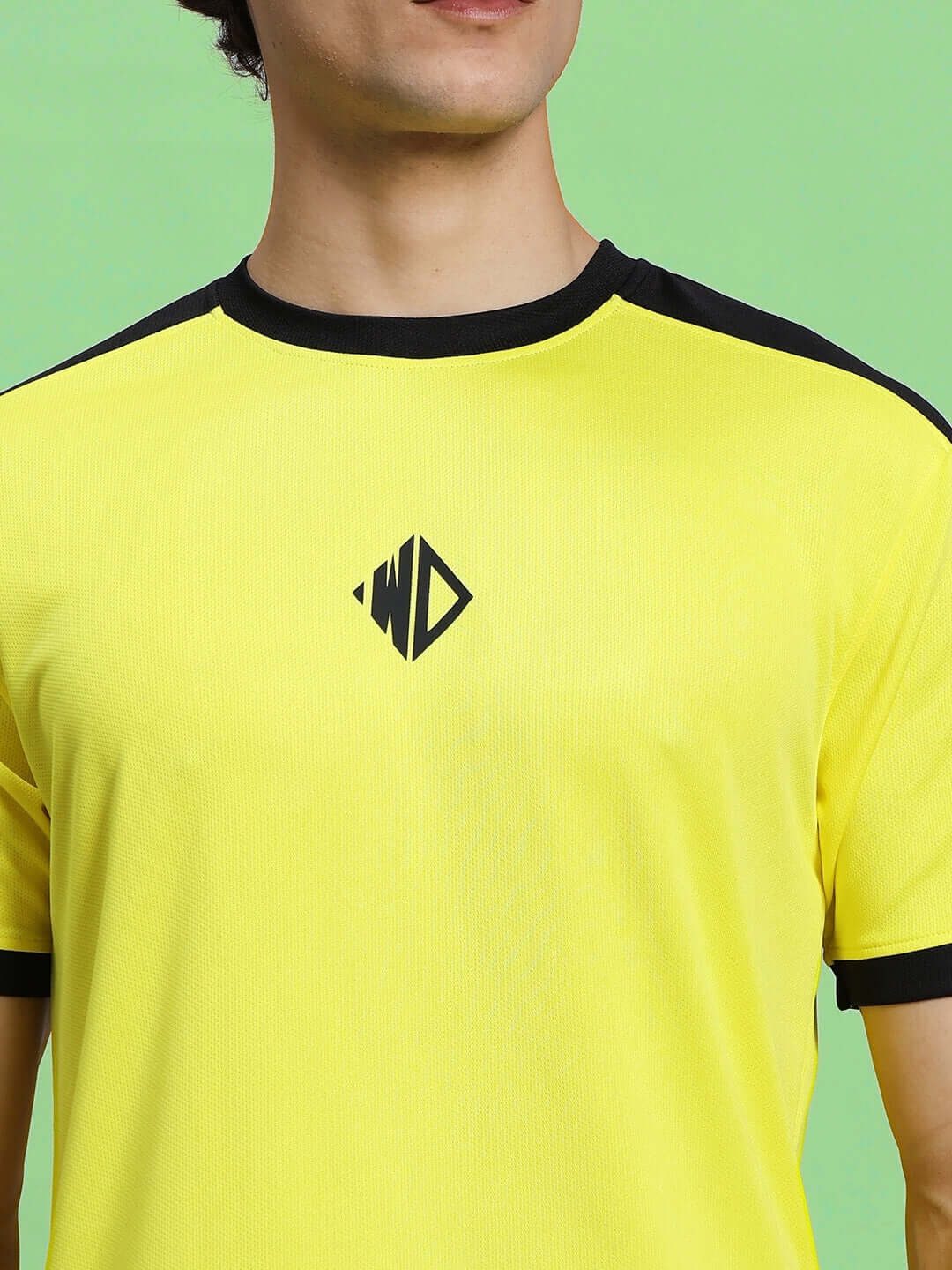 Man wearing a yellow Sherpa regular fit T-shirt, made of sports polyester fabric, suitable for cold machine wash, by Color By Colours.
