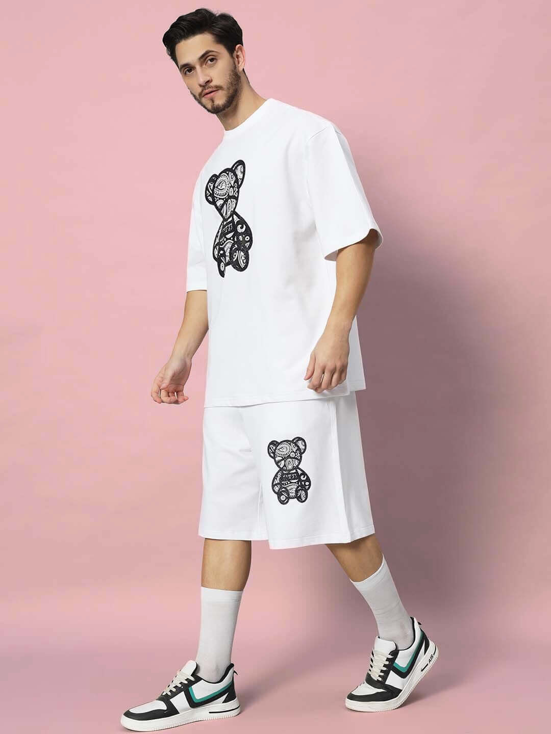 Man wearing SHIMMY CO-ORD SET in white with bear design, premium heavy gauge cotton terry, stylish and comfortable outfit.