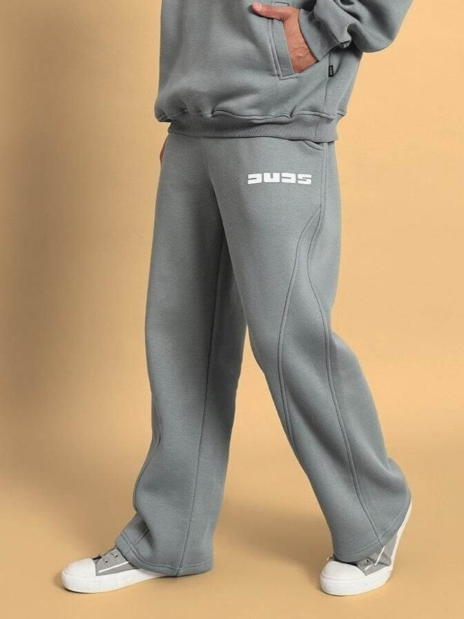 Model wearing SHOOTER COTTON FLEECE CO-ORD GREY hoodie and joggers set showcasing relaxed fit and modern design.