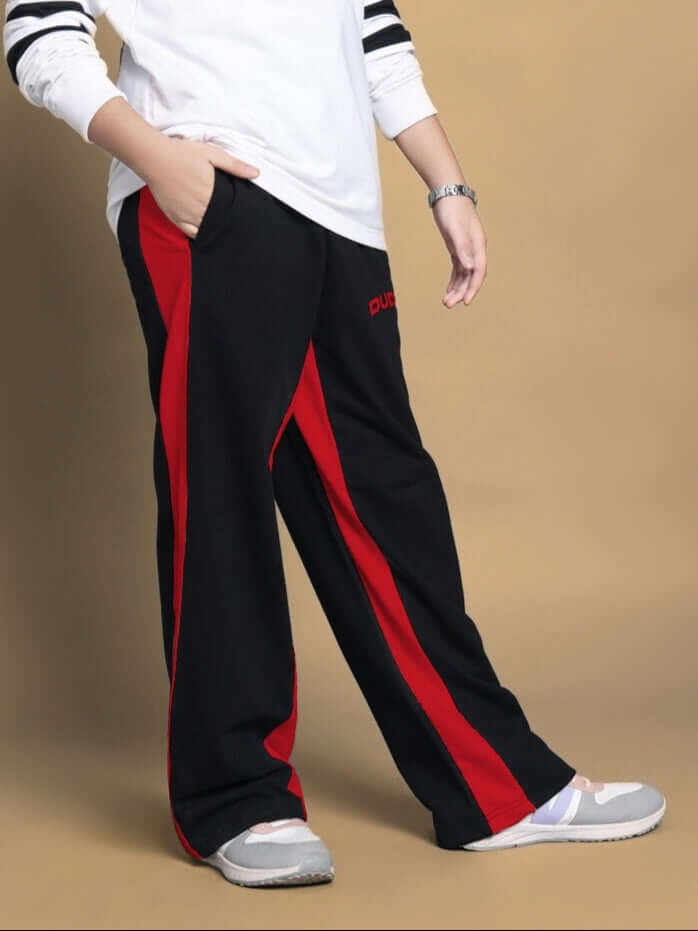 Black and red side seam baggy jogger for boys and girls, featuring a comfortable fit and custom size options.