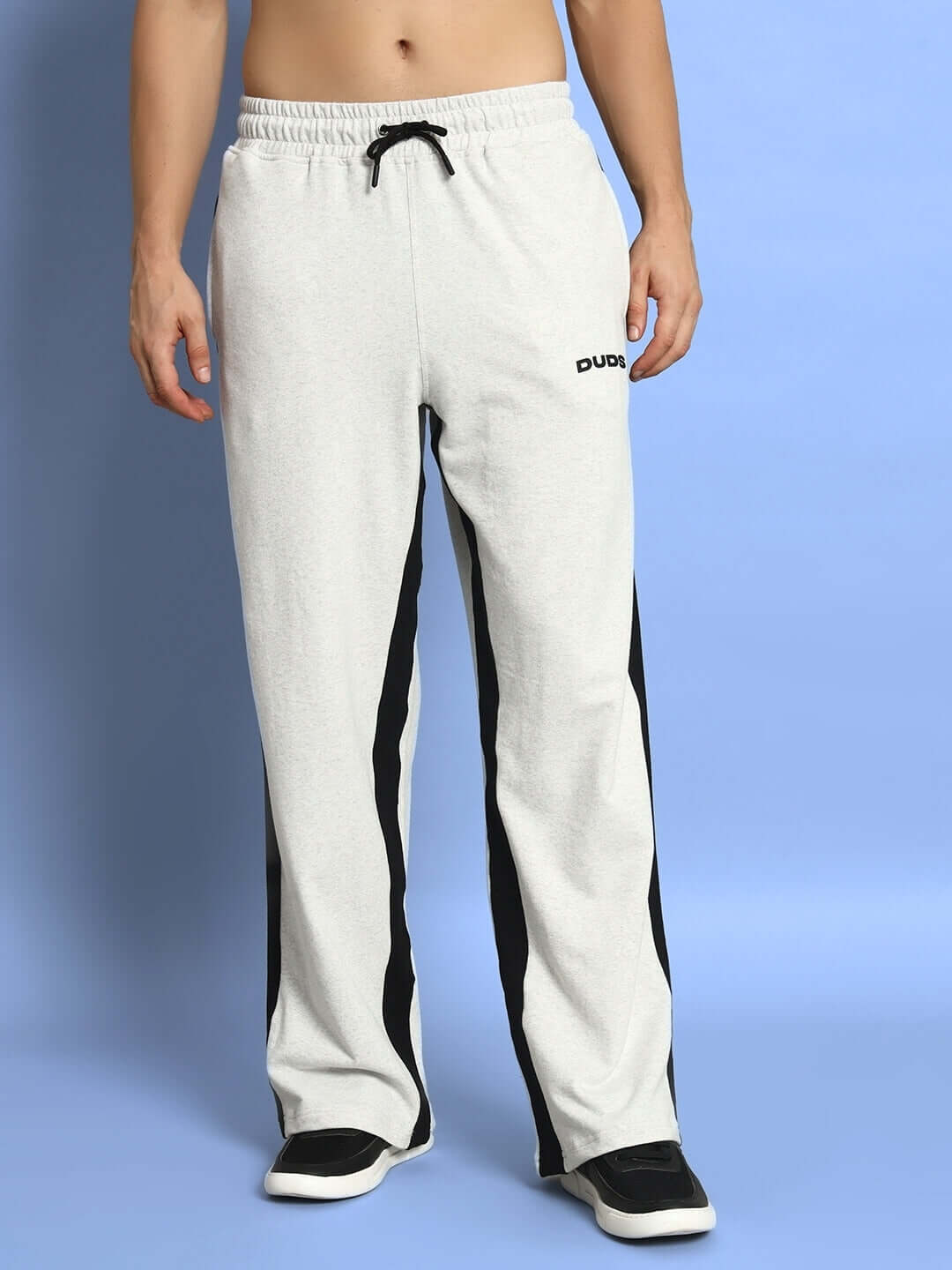 Side seam baggy joggers in melange grey-black with custom fit option, crafted by DUDS. Made-to-order with 7-10 days dispatch.