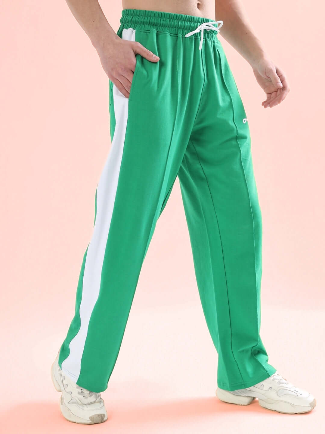 Green side seam plated joggers with white stripe, featuring elastic waistband and custom fit option, made by DUDS.