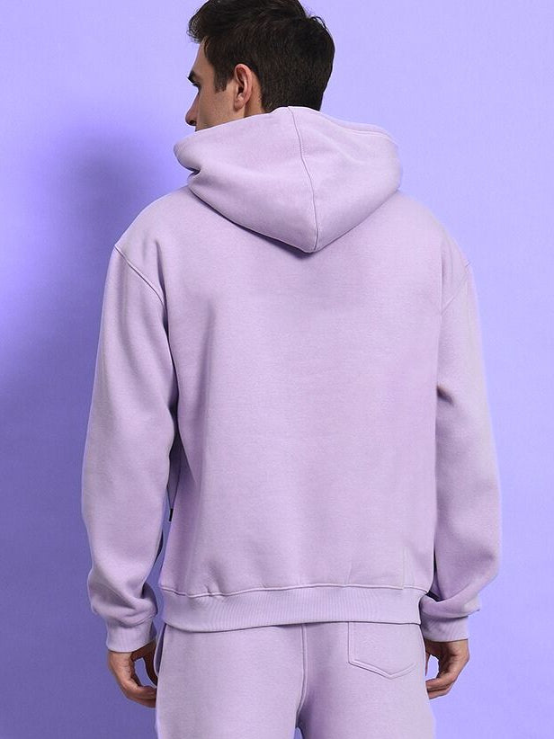 Back view of SILENT HUG PRINTED FLEECE HOODIE LILAC worn by a model.