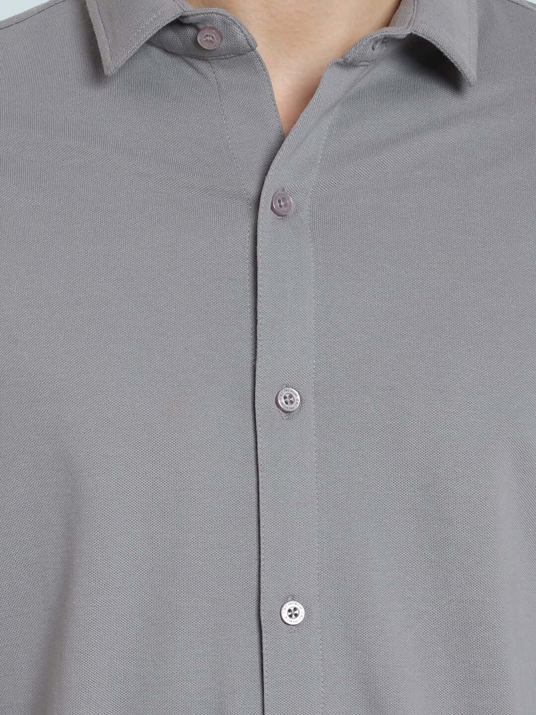 Silver grey sporty pique shirt with full sleeves, slim fit, curved hem, and superior stretch fabric, ideal for all-day comfort.