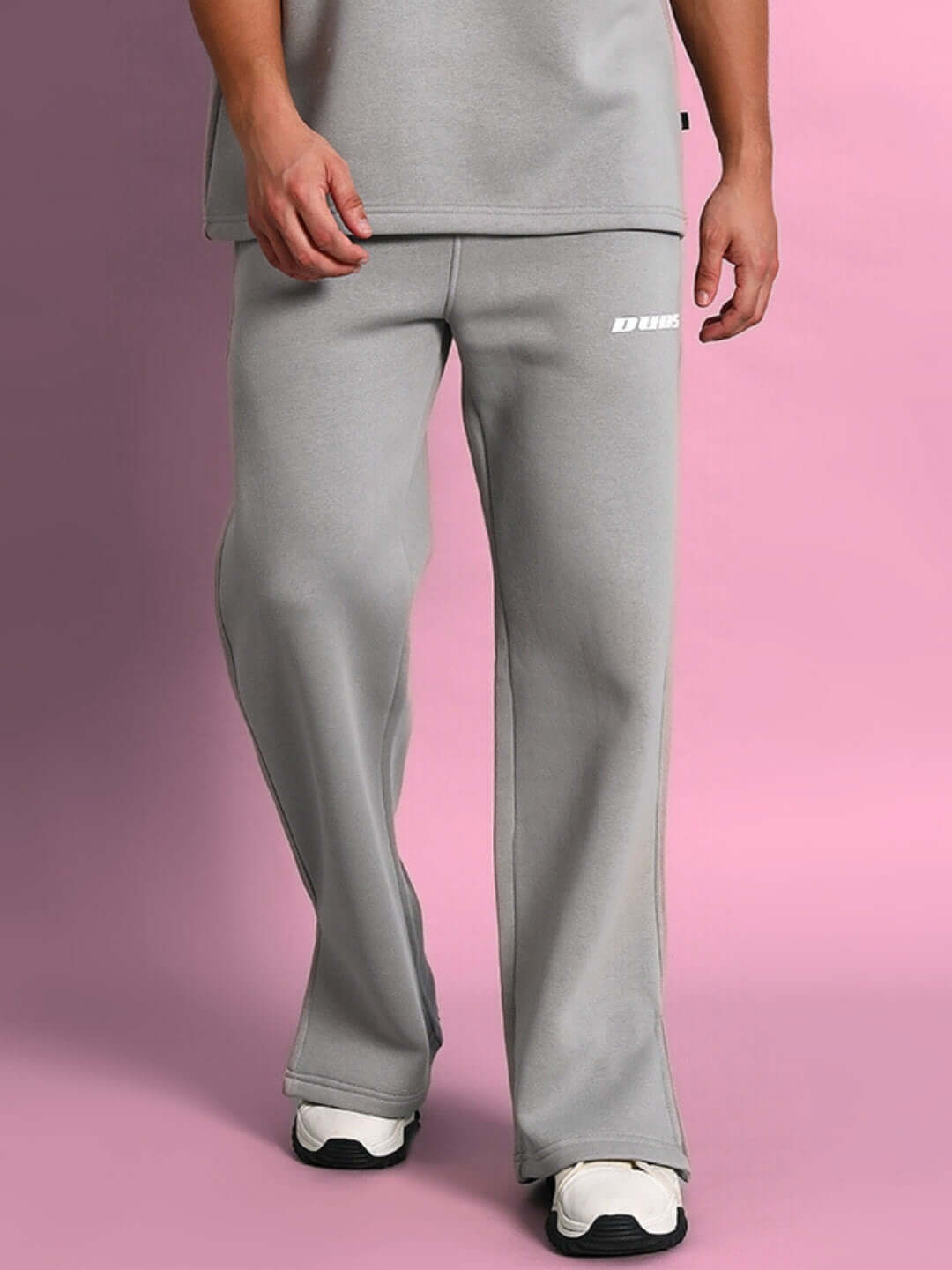 SKODA Cotton Fleece Jogger in grey, perfect for workout and casual wear, displayed against a pink background.