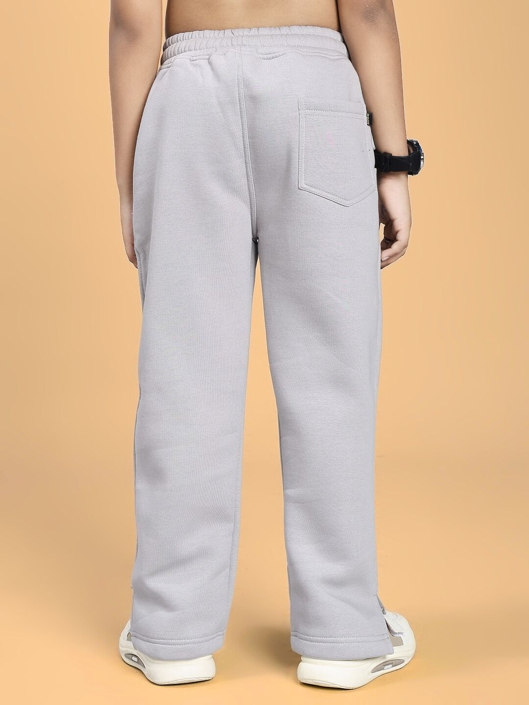 Back view of SKODA FLEECE JOGGER FOR BOYS AND GIRLS GREY showcasing soft fabric and relaxed fit, perfect for comfort and style.