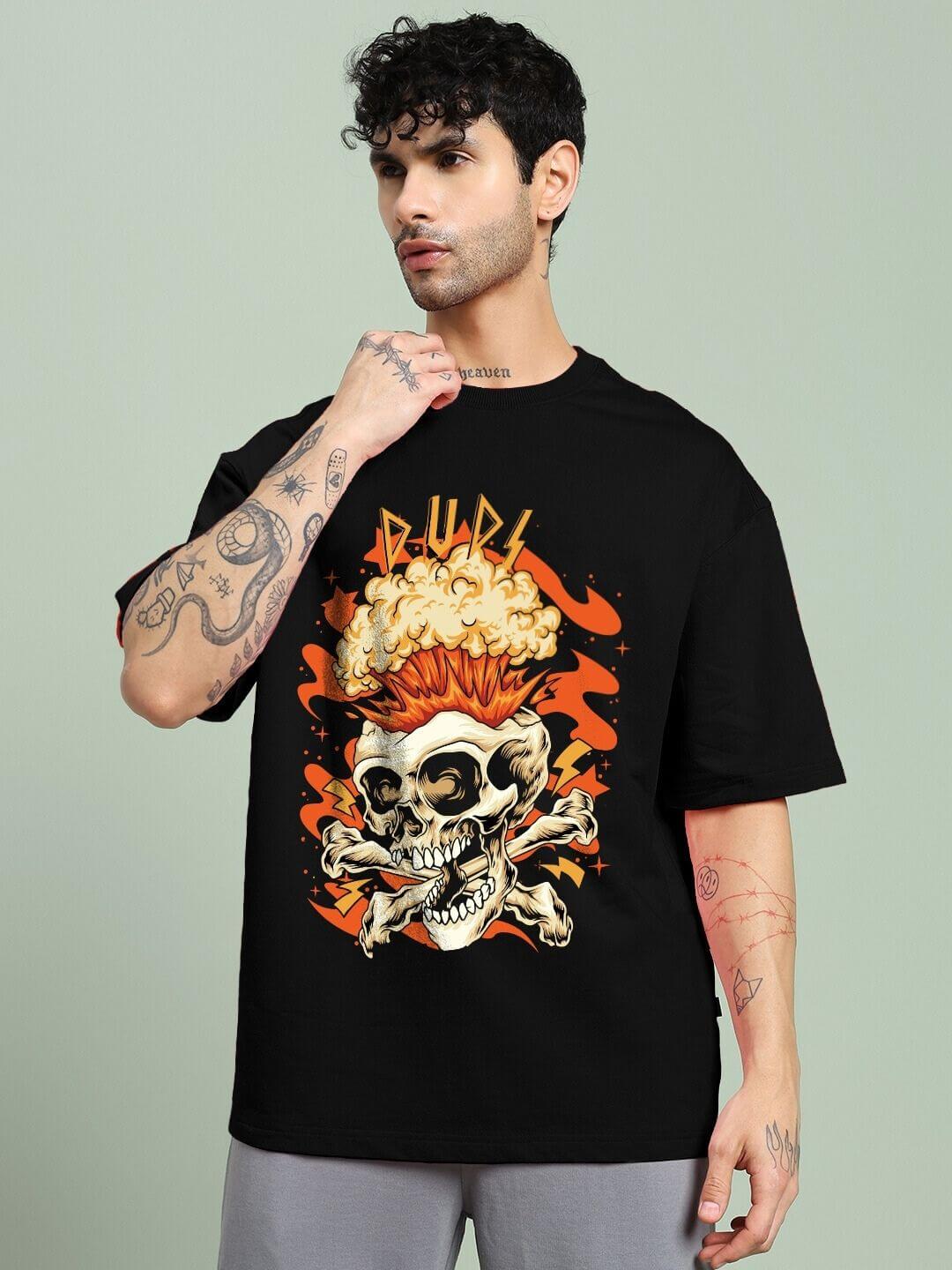 Person wearing Skull Blast Fire Print Oversized T-Shirt Black with skull and fire design, showcasing bold street fashion style.