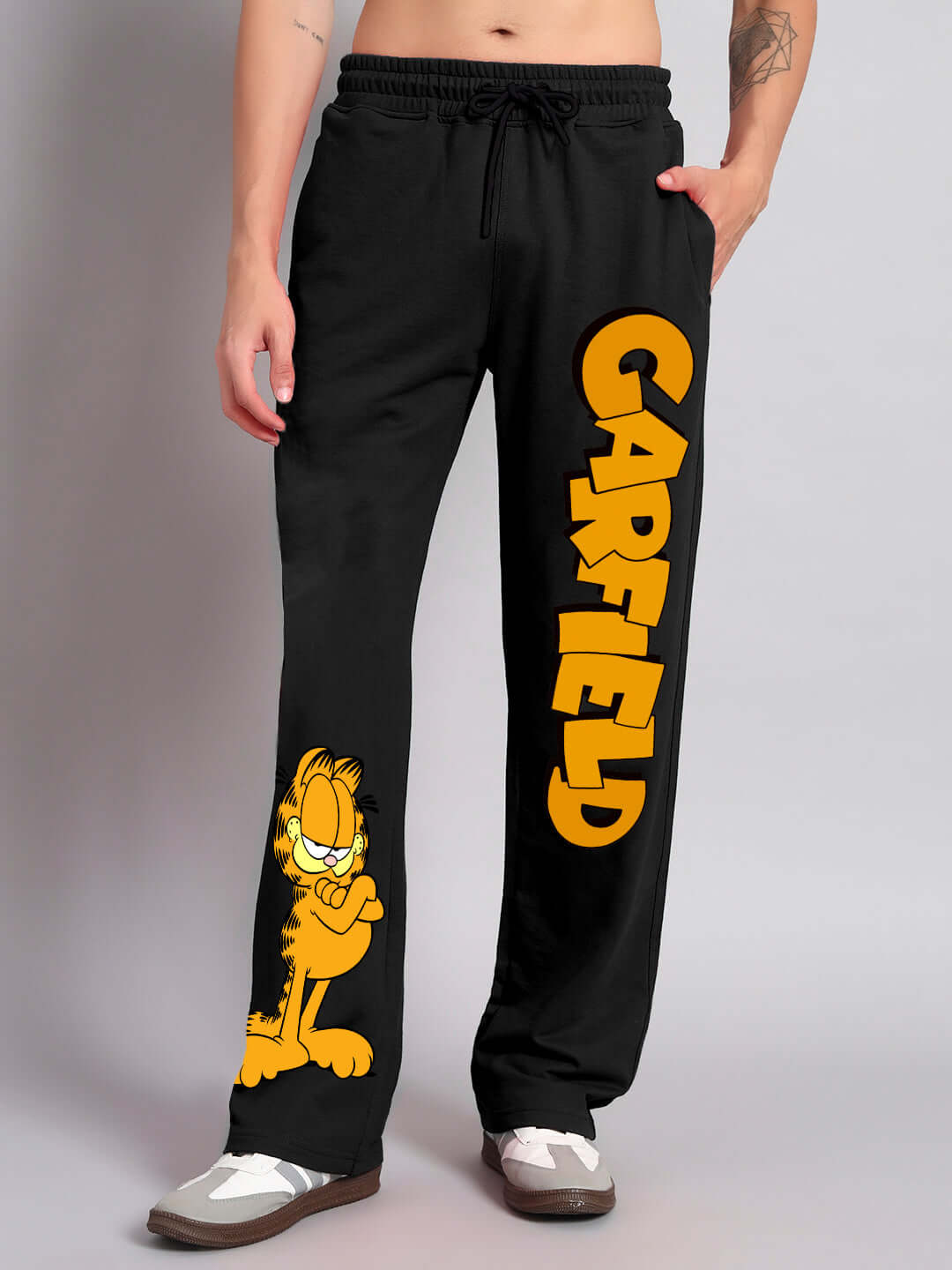 Black relaxed fit joggers with Garfield design, showcasing a comfortable style for custom fit options by DUDS.